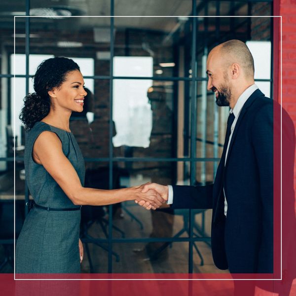 a man and woman shaking hands