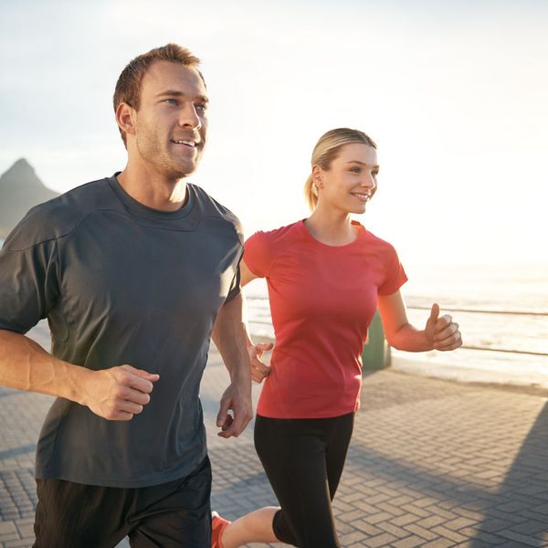 a man and woman out for a run