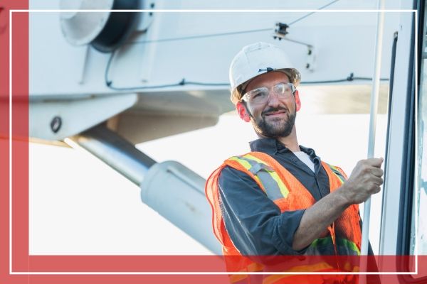 A crane operator intently reviewing certification materials in a Springfield, Missouri, setting, surrounded by documents and manuals. A crane operator intently reviewing certification materials in a Springfield, Missouri, setting, surrounded by documents and manuals.