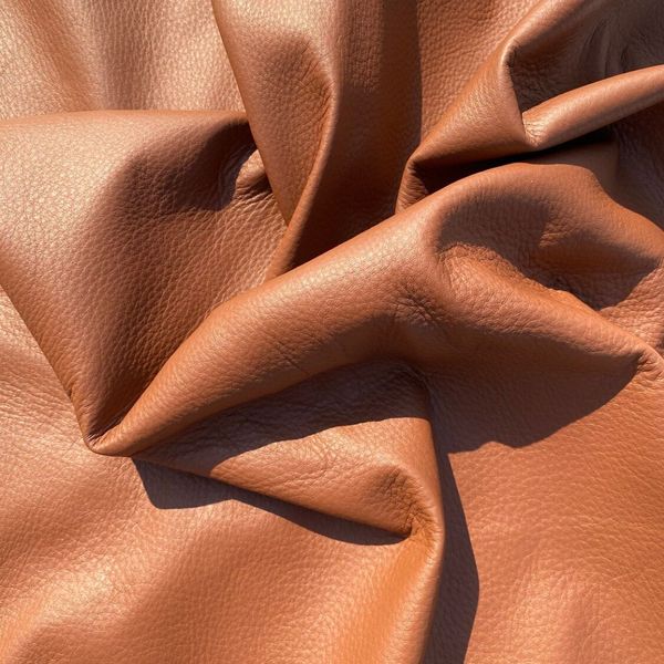 coated brown deerskin leather