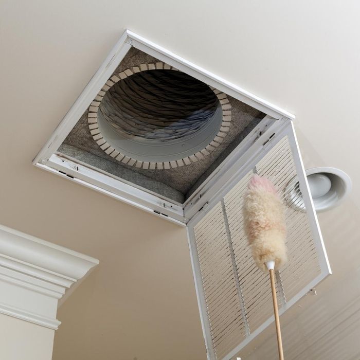 image of cleaning an air vent