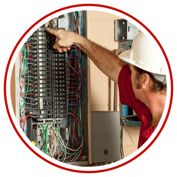 electrician working on electrical panel electrician working on electrical panel