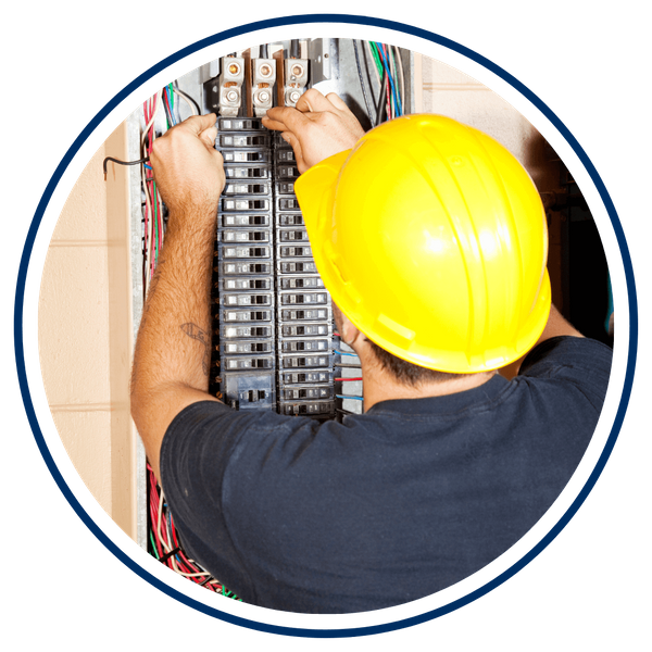 electrician working on circuit breaker electrician working on circuit breaker
