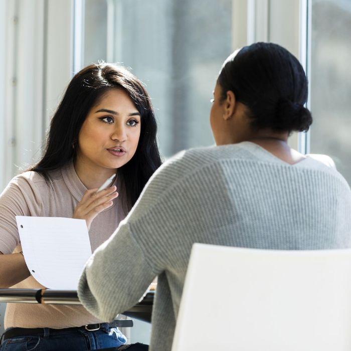 two adults having a serious conversation