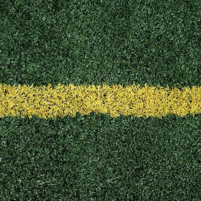 Yellow line on a turf field