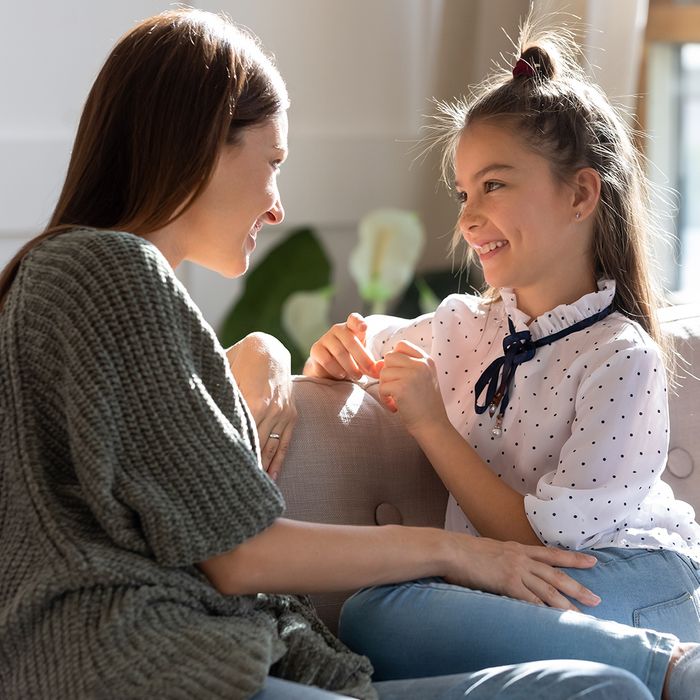 Child getting support from a parent figure