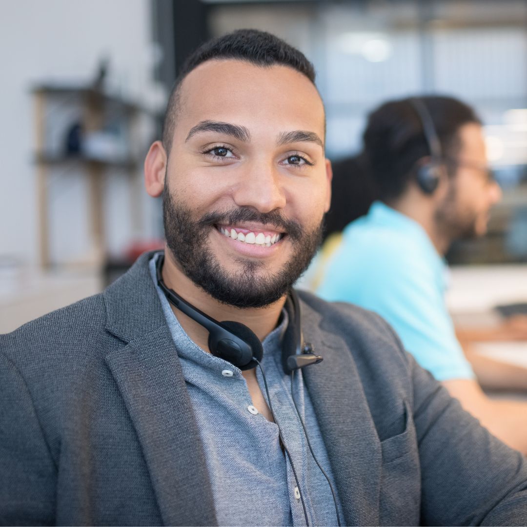 smiling professional wearing headset