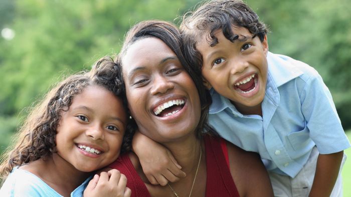 smiling mom with kids