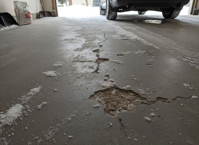 Cracked Garage Floor with Salt and Ice