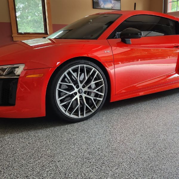 car on new epoxy garage floor