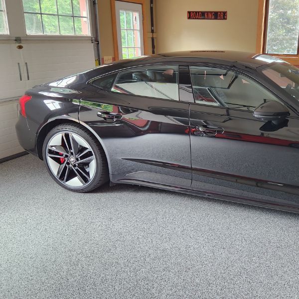 car in garage with epoxy floor car in garage with epoxy floor
