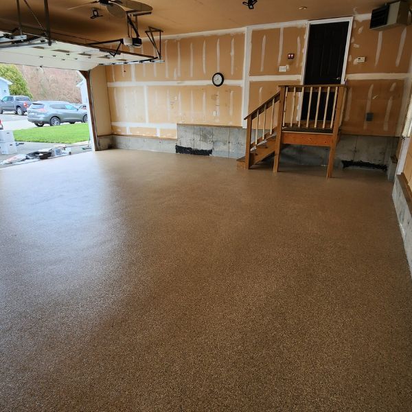 garage with newly laid flooring