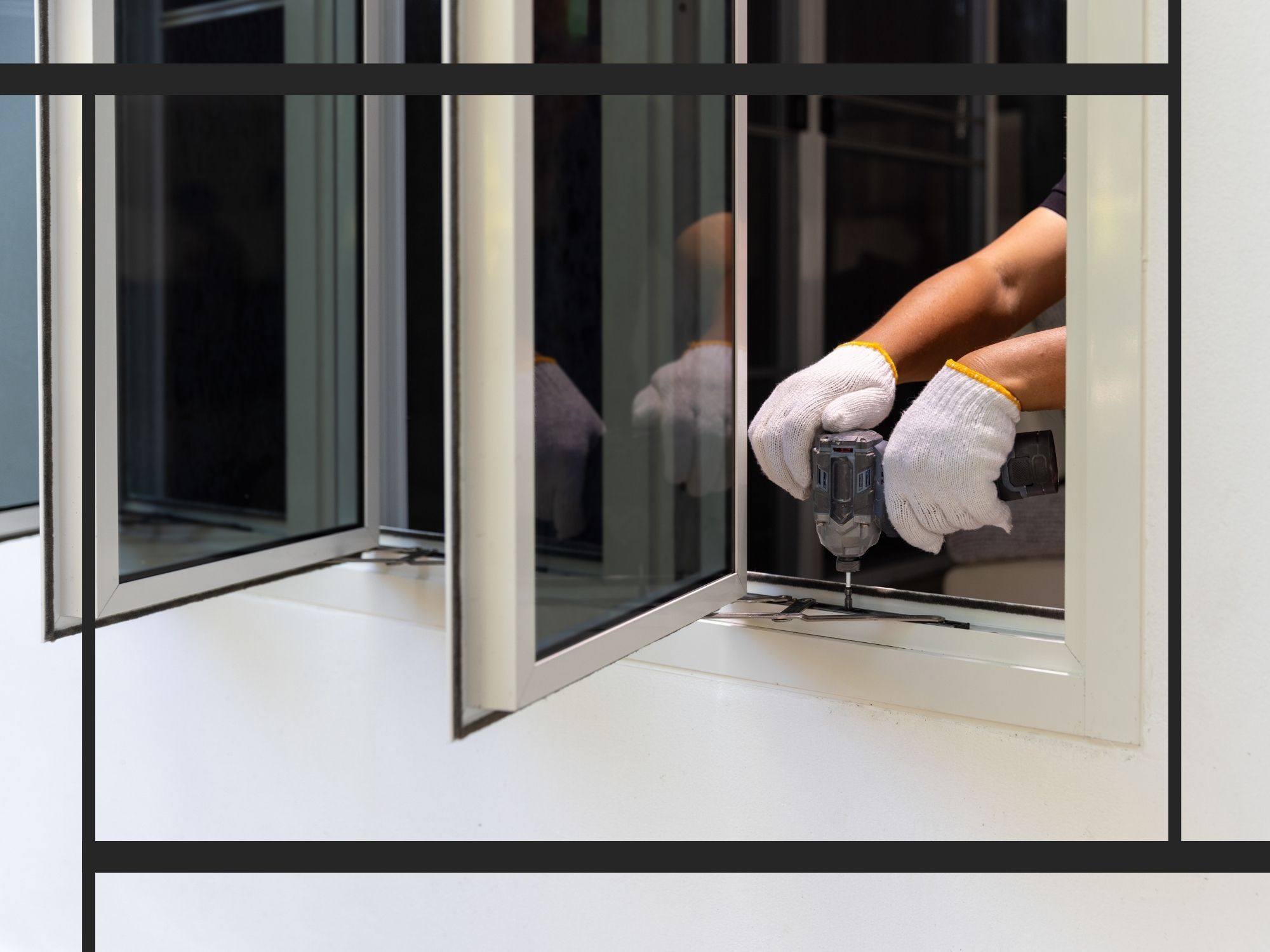 A detailed view of a technician's hands in white protective gloves using an impact driver to repair or install a white-framed casement window