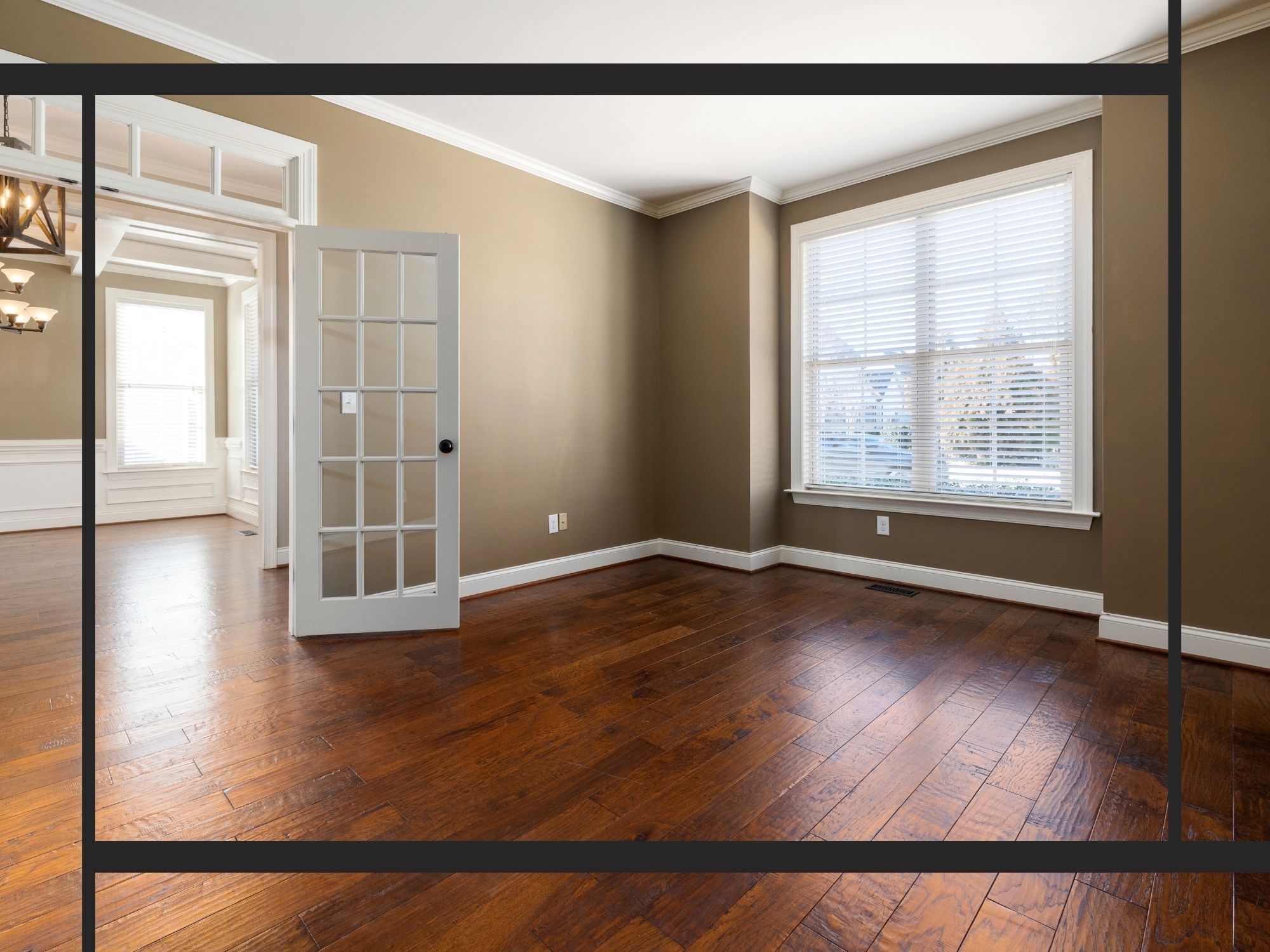 Empty room with hardwood flooring