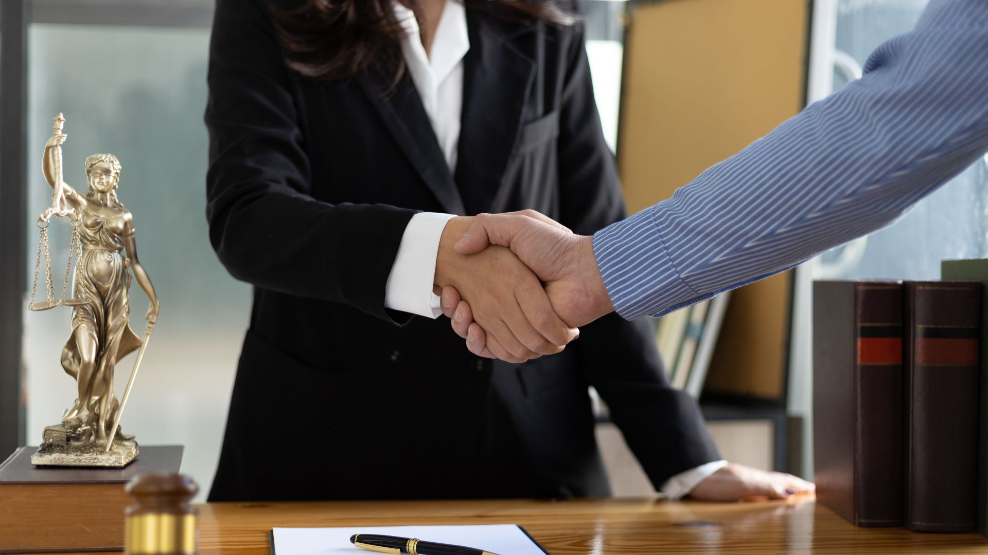 two people shaking hands