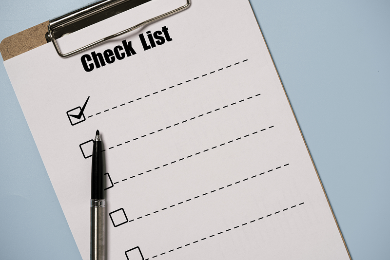 Checklist with a Pen on a Clipboard