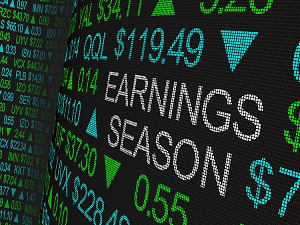 Stock ticker board with the words Earnings Season