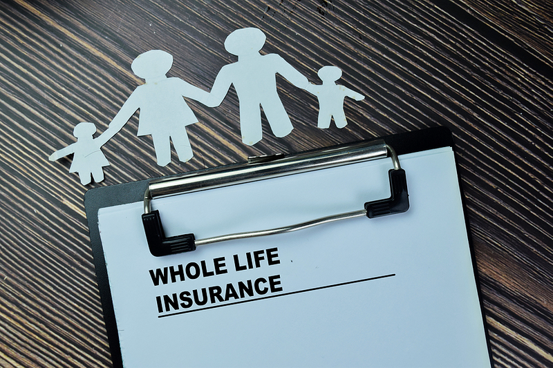 Whole Life Insurance Document with Family Paper Cutout