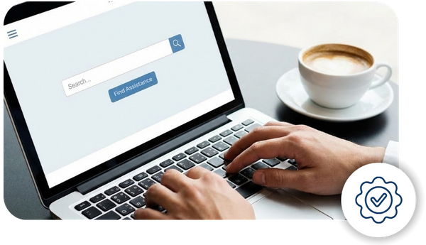 A person uses a laptop to search for national down payment assistance programs