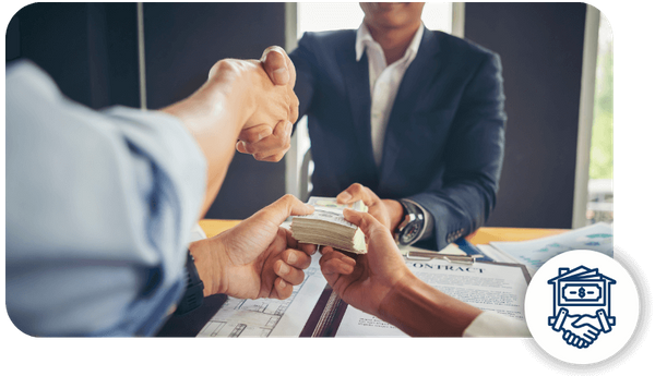 people handing over a stack of money and shaking hands with a business woman