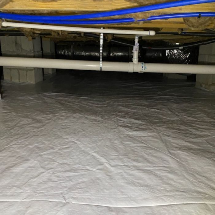 Crawl space insulation and pipes