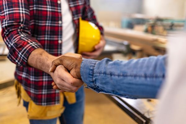 Contractors shaking hands