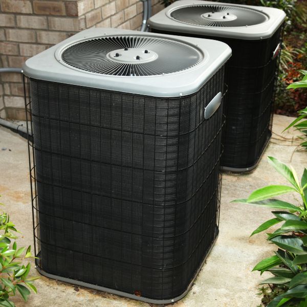 Outdoor units with cleared debris. Why Is My AC Running but Not Cooling2.jpg