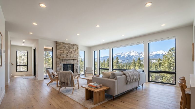 Modern living room featuring a perfectly smooth, freshly painted white ceiling and bright contemporary lighting.