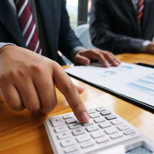 lawyer consulting with a bookkeeper lawyer consulting with a bookkeeper