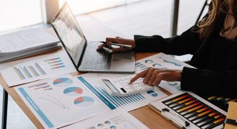 professional bookkeeper working through accounts