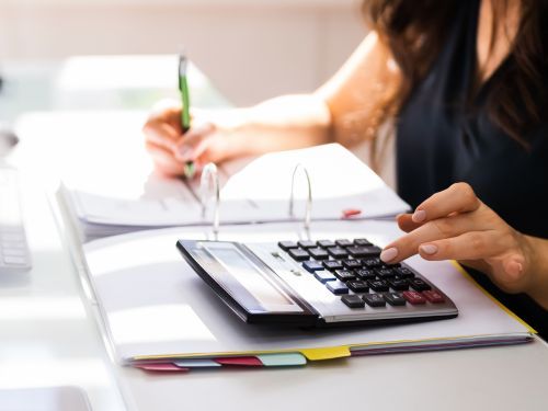 woman calculating accounts receivable