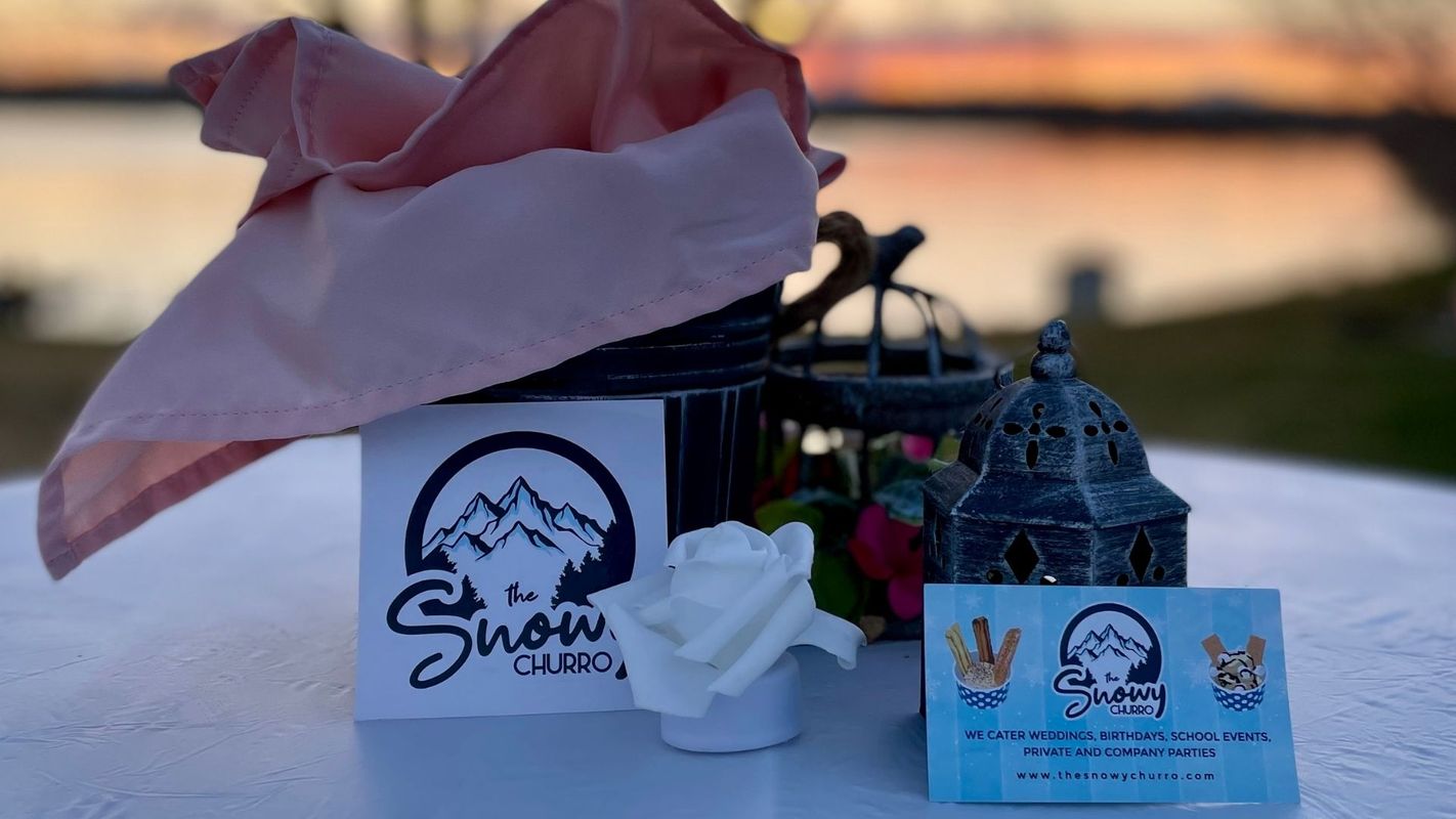 Snowy Churro cards on wedding table