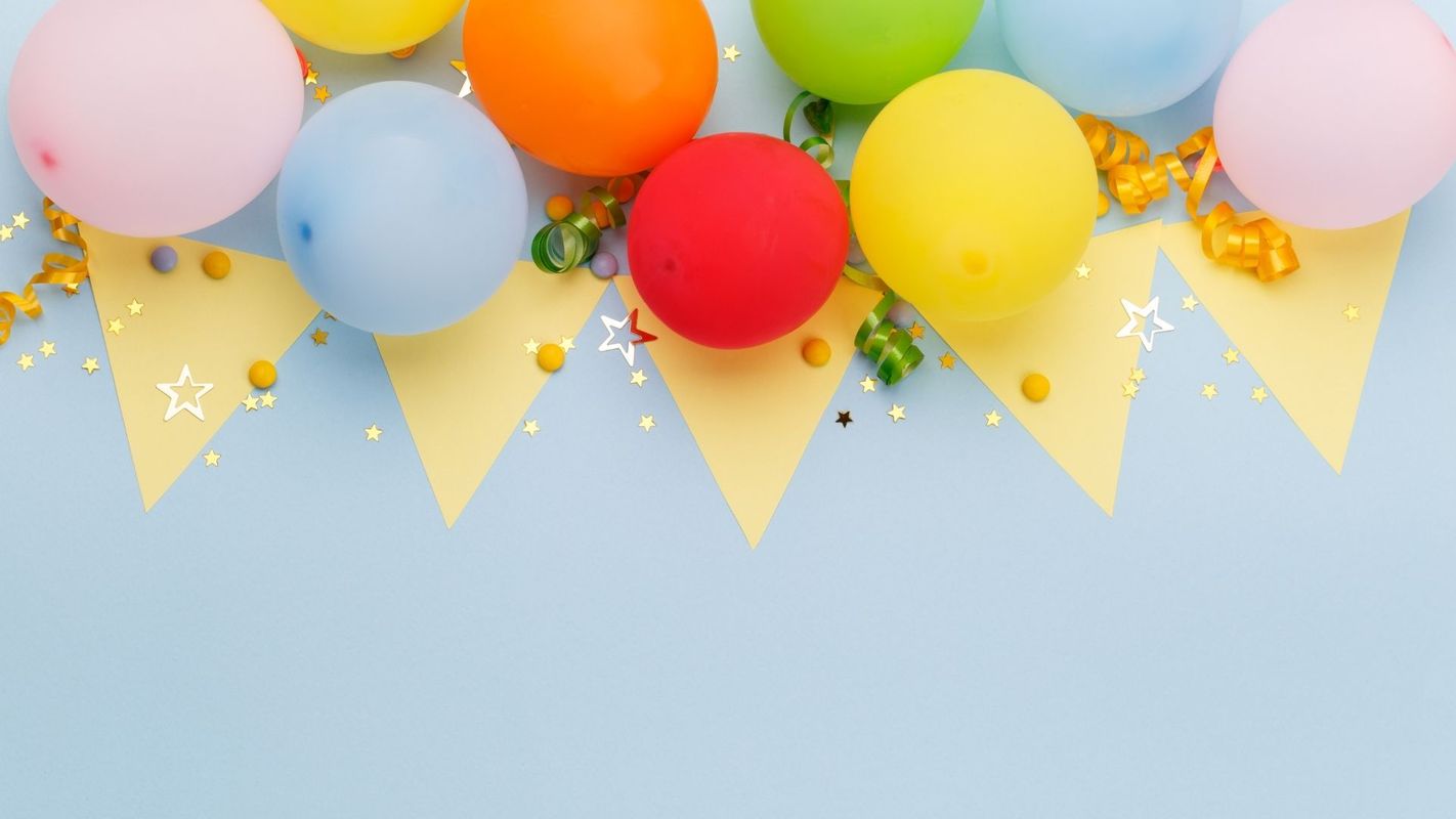 birthday decorations including balloons and banners