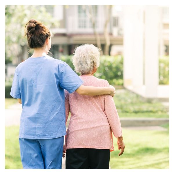 Caregiver with arm around client