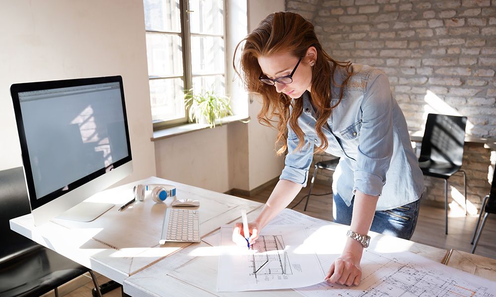 Garage door designer at her desk