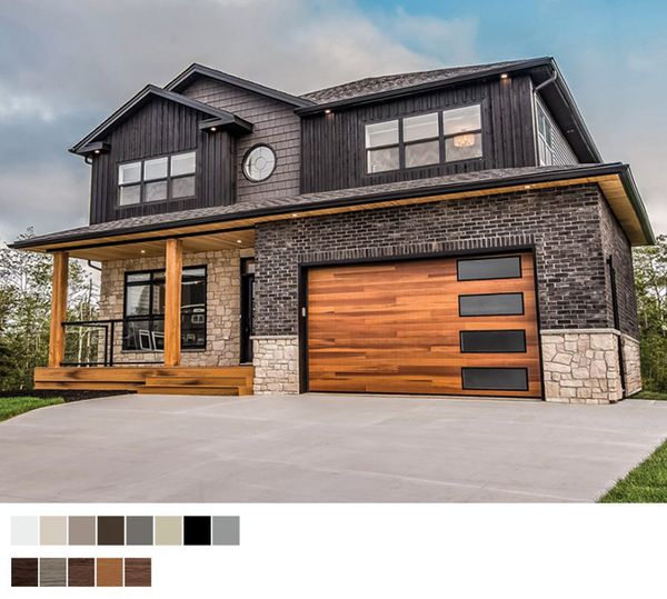 Modern house with wood garage doors