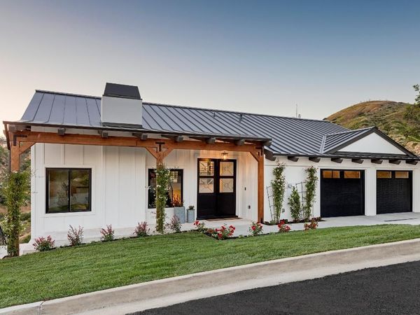 Modern house with dark garage doors