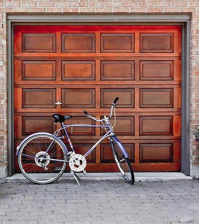 Bike in front of wood garage door