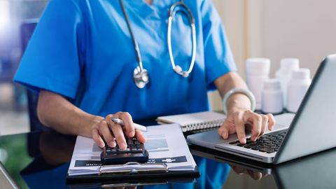 nurse on computer