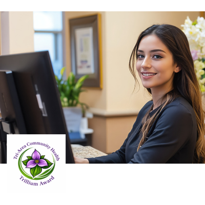 Front Office clerk with Trillium Award Logo
