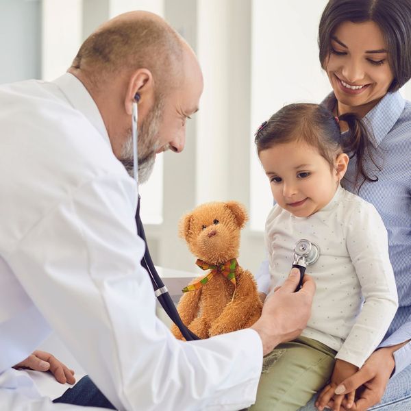 doctor checking a toddler