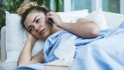 sick woman on phone
