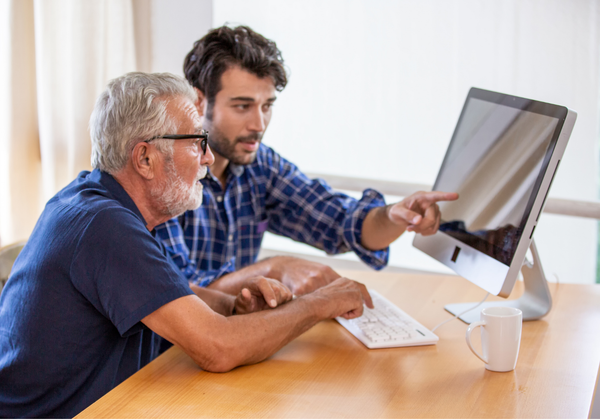 two people using computer.png