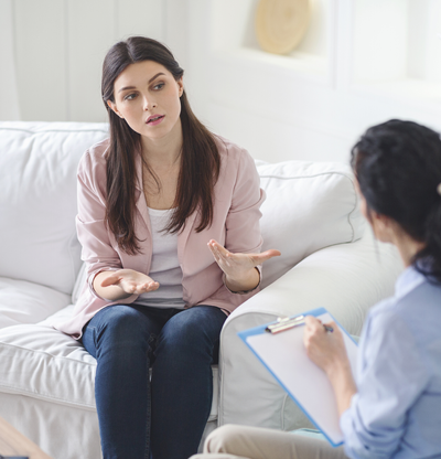 woman talking to counselor