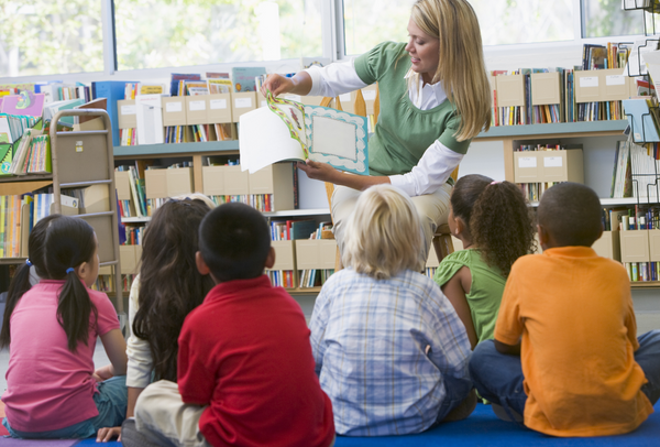 teacher reading to students