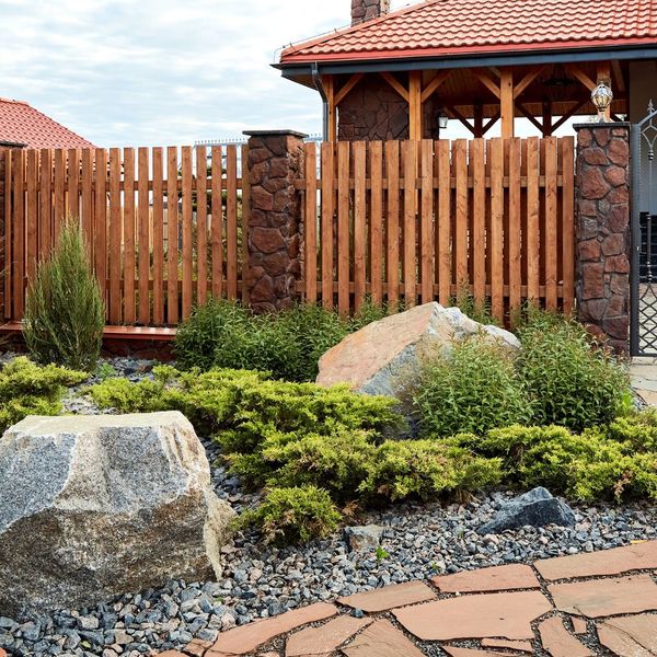 large boulders in backyard landscaping