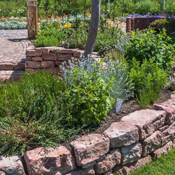 landscaping, red stone retaining walls