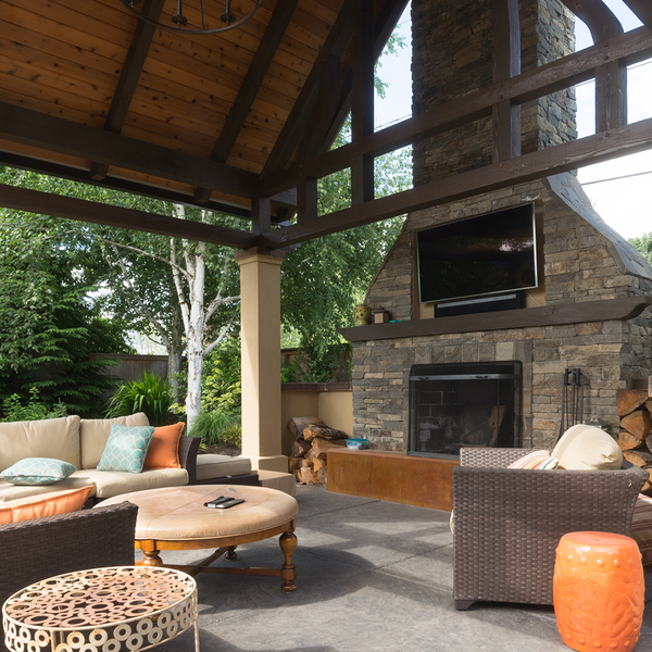 outdoor fireplace with patio furniture