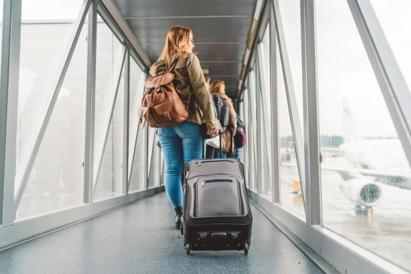 woman boarding plane