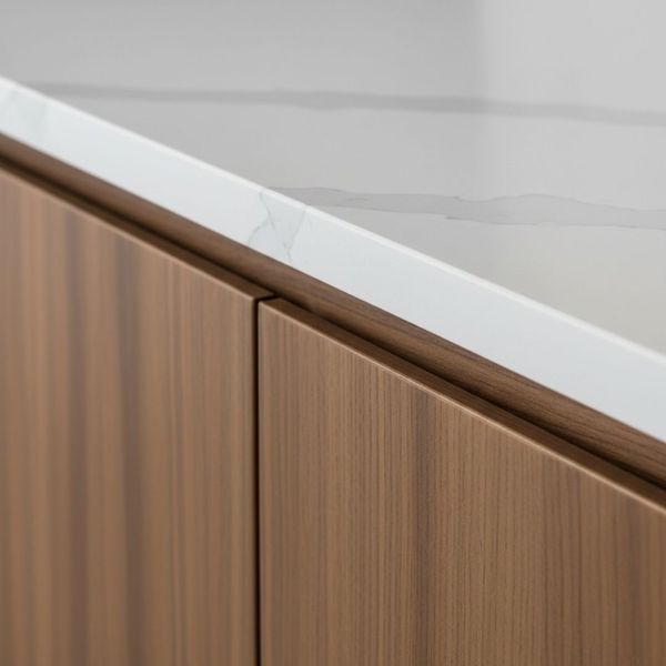 Close-up of premium quartz countertops and custom cabinetry for a San Diego kitchen renovation.